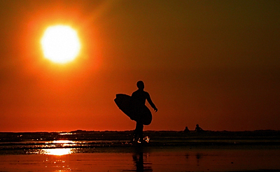 SUNSET SURFER